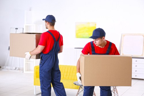 Removal team preparing a house move in Reading street