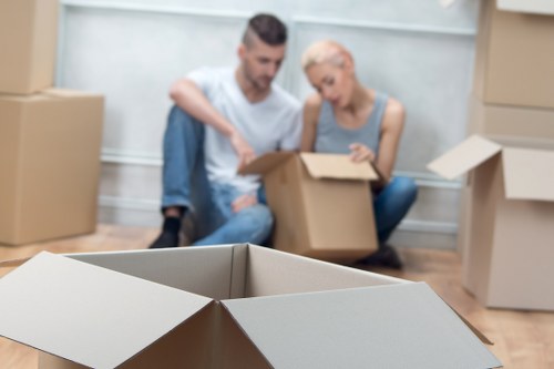 Moving van and packed boxes ready for transport