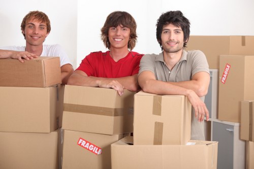 Commercial movers loading equipment for a Reading relocation